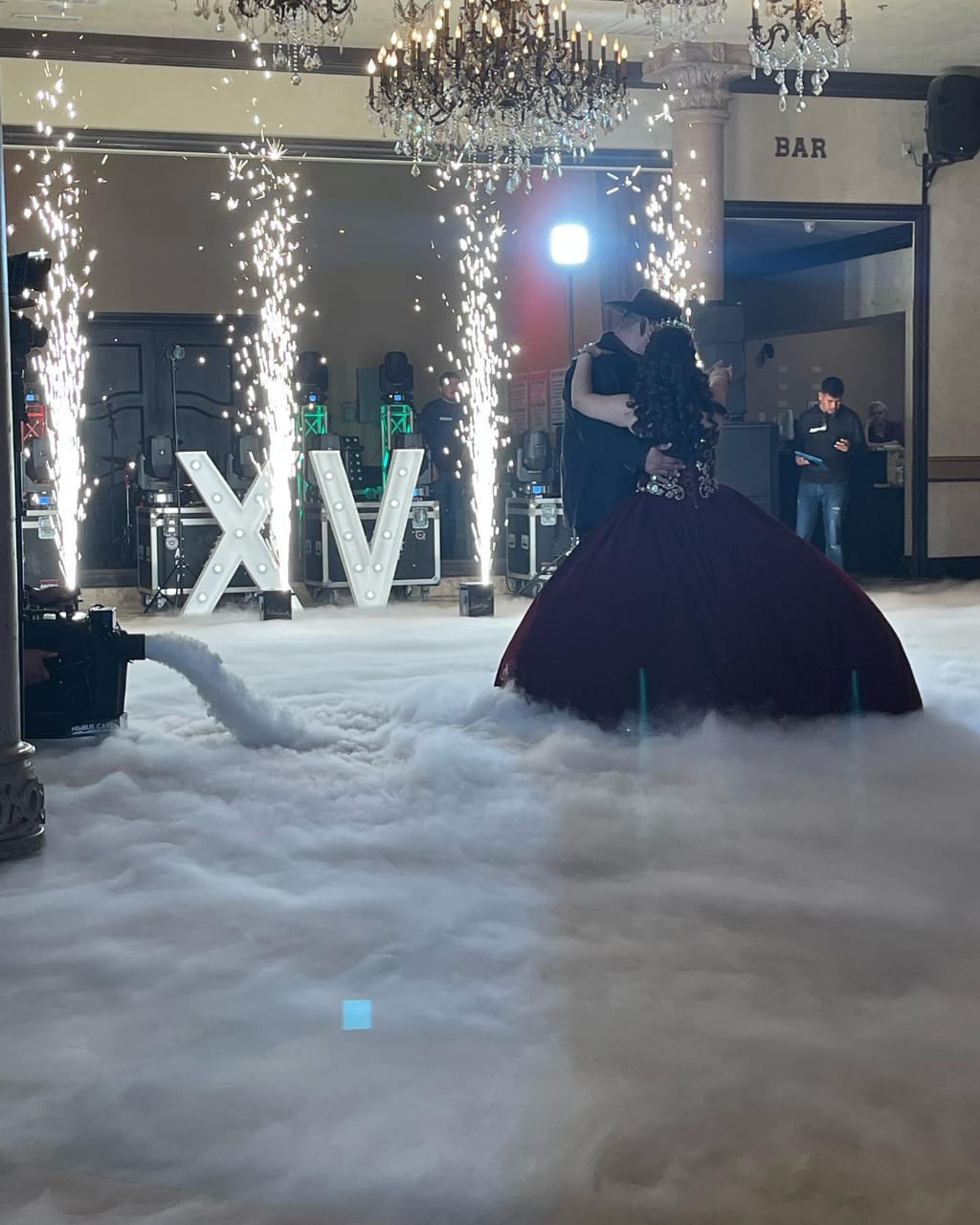 Cold Spark Machine creating an enchanting atmosphere with sparks and fog during a dance at a wedding.
