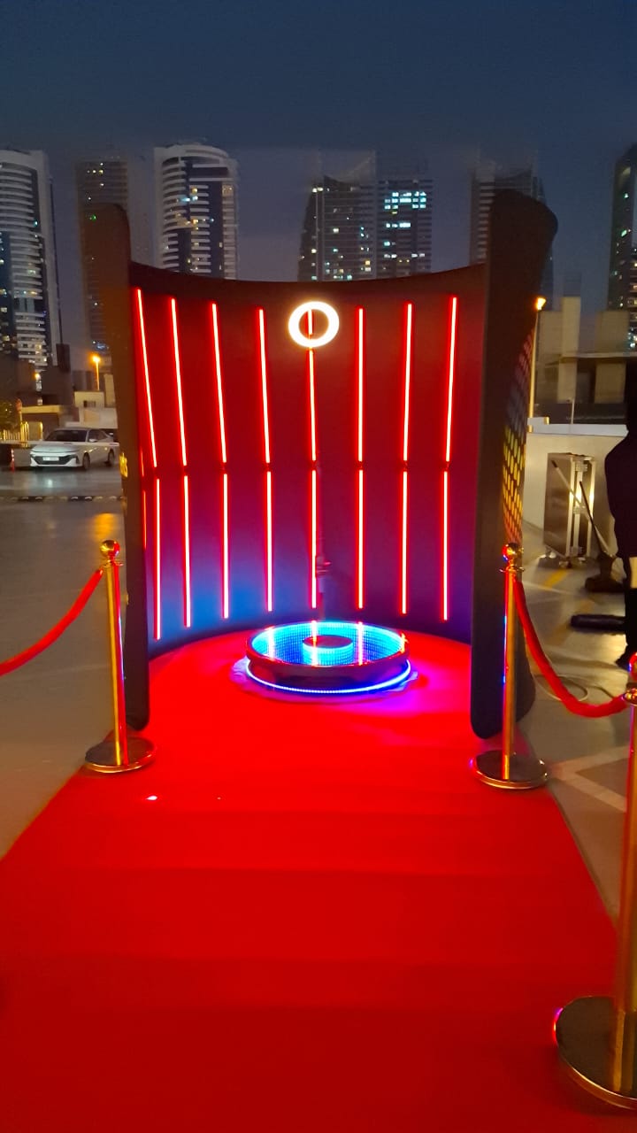 LED Backdrop rental with vibrant lights and red carpet for events and parties.